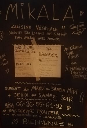 Menu at the front door at Mariposas in Marseille