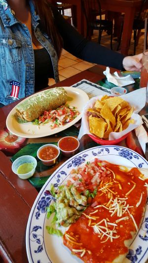 Vegan Chimichanga in green sauce & a vegan quesadilla with red sauce.  at El Papagayo in Carmichael