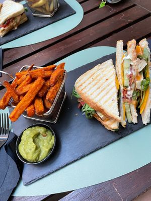 Club sandwich with sweet potato fries and guacamole. at Ma'Rinas - Veggiezz in Karlsruhe