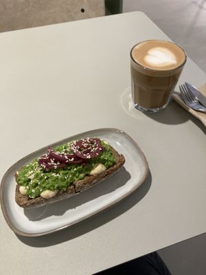 Smashed pea and avocado toast with cappuccino   at Vital Foods in Copenhagen