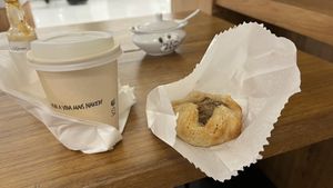 matcha e folhado de cogumelos  at Naked Coffee - Higienópolis in Sao Paulo