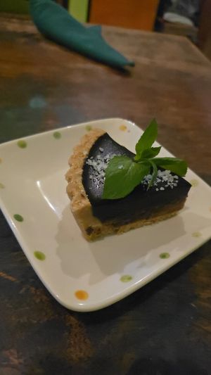 Chocolate salted caramel tart (not vegan) at Akar Cafe in Lovina