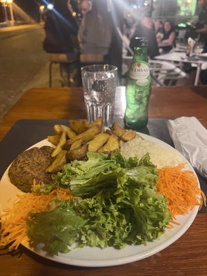 Lentil burger, fries, rice, salad  at Café Oceano in Vila Praia De Ancora