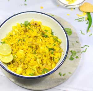 POHA: A common household Indian breakfast and snack made from flattened rice that is steam cooked with onions, spices and herbs. 

Hurry! Hurry! 🏃‍♀️🏃‍♂️ at Curry in a Hurry in Omaha