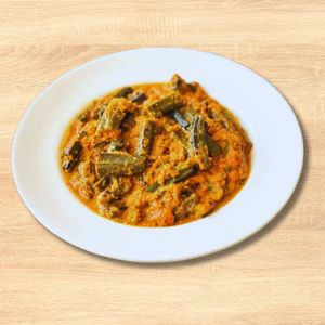 Bhindi / Okra Masala
A delicious and aromatic dish made with bhindi/okra cooked in a flavourful tomato onion gravy. Served over long grain basmati saffron rice.  at Curry in a Hurry in Omaha