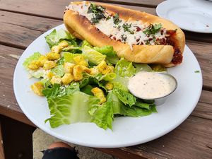 Vegan meatball sub + vegan Caesar salad at Johnny Rads in Baltimore
