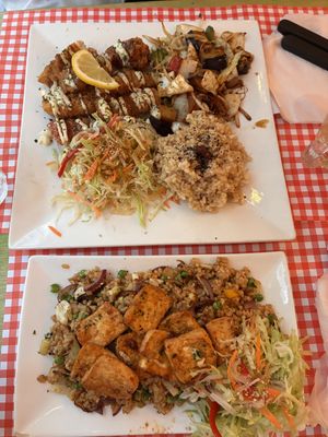Plate with sausage and bacon, and fried rice with tofu (spicy requested)  at TerraZen Centre in Amsterdam