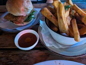 Kama kuku burger and sweet potato fries at Ethos Conscious Food in Nairobi