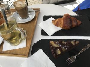 Chocolate/pear cake and orange croissant.   at Robert Capa Café in Budapest