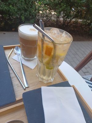 Chai latte with a shot of espresso and elderflower lemonade at Robert Capa Café in Budapest