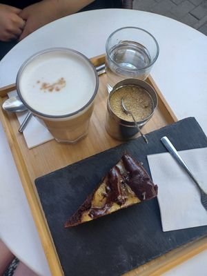 Chai latte and chocolate-pear cake at Robert Capa Café in Budapest