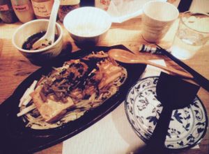 Tofu with sprouts and a mushroom sauce and rice and a soup as an appetizer at Heianraku in Takayama
