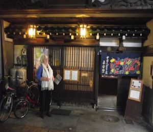 My wife at the front of Heianraku at Heianraku in Takayama