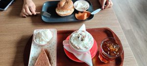 Bagel with vegan cream cheese and ham, cocoa with cream, cold brew and tiramisu at Valkyrjan Bistro & Bar in Reykjavik