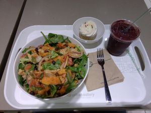 A zebra bowl, smoothie and vanilla cupcake. at Urban Herbivore - Eaton Centre in Toronto