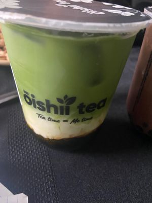 Mango matcha green tea latte with oat milk and black pearl boba.  at Oishii Tea in Brampton