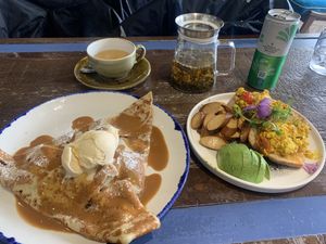 Naughty vegan crepe and tofu scramble with sourdough bread and added sausage and avocado    at Crêpe Maison in Guernsey