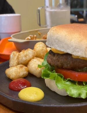 Burger and tater tots  at Cosmos Grocery Cafe in Seoul