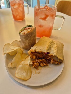 I split the wrap and ciabatta with my partner to try both. at Cosmos Grocery Cafe in Seoul