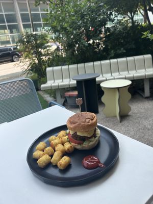 Vegan cheeseburger (ask for tots extra crispy)  at Cosmos Grocery Cafe in Seoul