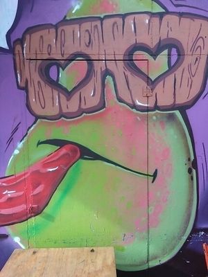 Artwork outside cafe at EmmaPea Vegan Food and Bar in Berlin