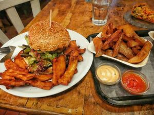 Thai pea burger & tandoori wedges  at EmmaPea Vegan Food and Bar in Berlin
