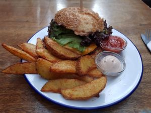 Cheeseburger and tandoori wedges   at EmmaPea Vegan Food and Bar in Berlin