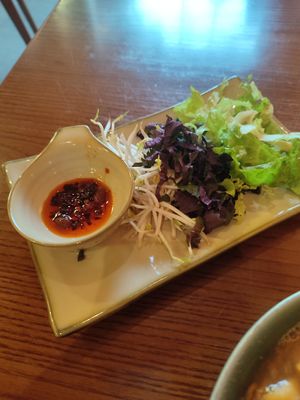 Spicy oil and add ins for the pho at CHAYFOOD in Hanoi