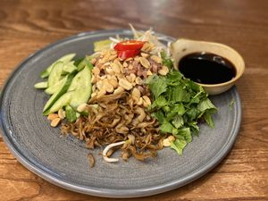 Brown noodles with mushrooms. Very yummie w the peanut sauce I added from the spring rolls.   at CHAYFOOD in Hanoi