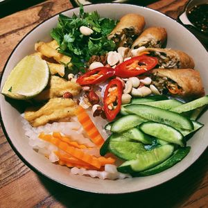 Rice noodle bowl with spring rolls  at CHAYFOOD in Hanoi