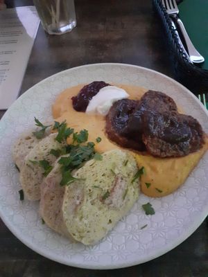 Svičková na smetané (sour cream, cranberry sauce, whipped cream and dumplings) at Vegan House in Prague