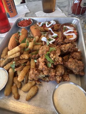 Sampler with pickle fries, tater skins, Mozzarella sticks, popcorn chikkin   at Station No. 3 in St Louis