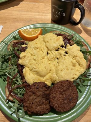 Avocado toast with “just eggs” and vegan sausages.   at Alexa's in Bothell