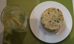 Lemon water; Potato salad at Loving Hut - Meditation Center in Ulaanbaatar