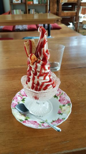 Soft-serve parfait with strawberry sauce. at Vegans Cafe and Restaurant in Kyoto