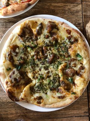 Curry pizza (super delicious) at Vegans Cafe and Restaurant in Kyoto