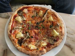 Margherita pizza  at Vegans Cafe and Restaurant in Kyoto