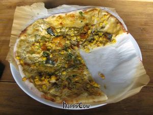 They gave me this pizza for free, because I had turned up while they were closed between lunch and dinner. at Vegans Cafe and Restaurant in Kyoto