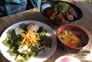 Charcoal-grilled deep fried tofu rice bowl set with a salad and miso soup at Vegans Cafe and Restaurant in Kyoto