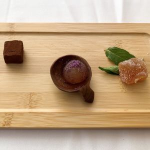 Petit fours: passion fruit jelly, ball of star anis and violet sugar and hazelnut praline   at DaiCa in Mallorca