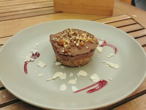 Dulce de chocolate con frutos secos y mermelada de frutos rojos at  Vegigan in Tenerife