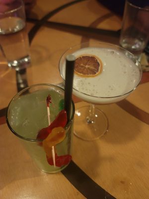 Drink with gummy worm was my sister's, vegan drink is on the right. at Storm Crow Manor in Toronto