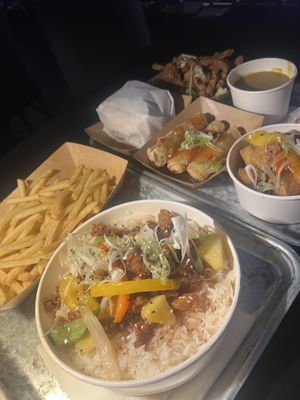 Sweet and sour bowl, spring rolls, popcorn tofu, original wings, chicken burger, chips and curry sauce   at Forked Up Vegan Kitchen - Blackstock Market in Liverpool