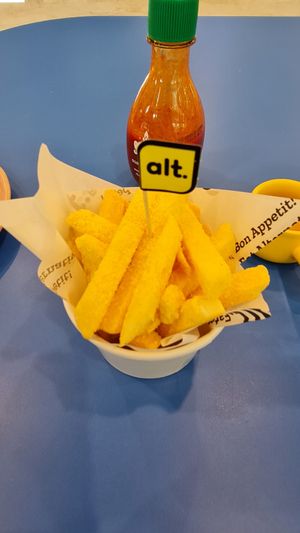 Sweet corn coated fries 🍟 at alt.Eatery in Bangkok