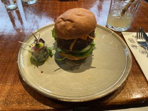 Black bean burger: quite good. The patty was not meaty, but sticky and soft (due to mashed beans). The potato salad was a culinary surprise with lemon, dille and creamy sauce  at Cravings For Green in Ede