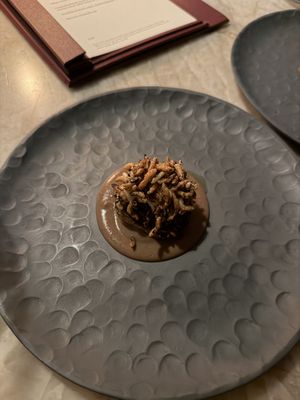 Barbecued maitake mushroom, black bean mole, kimchi, aioli & puffed rice  at Plates in London