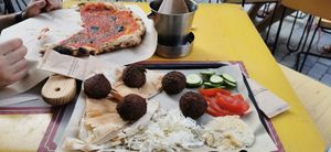 Falafel big portion ( 5pcs - never seen them this big) and Marinara pizza, both vegan and delicious. Falafel does come with youghurt dressing so need to order without at Fabrica Thassos in Thasos