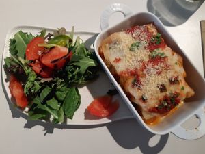 Lasagna with salad at Cultivate Food - Aker Brygge in Oslo