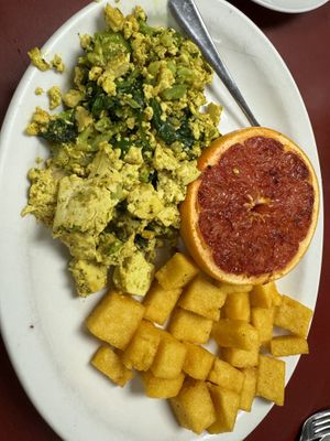 Vegan tofu scramble, polenta and grilled grapefruit   at The Country Corner Cafe in Saratoga Springs