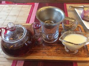 My tea, the tea bag timer, my cup and strainer and my soya milk cos that’s the way I like it.... at Tea Sutra Teahouse in Newcastle Upon Tyne